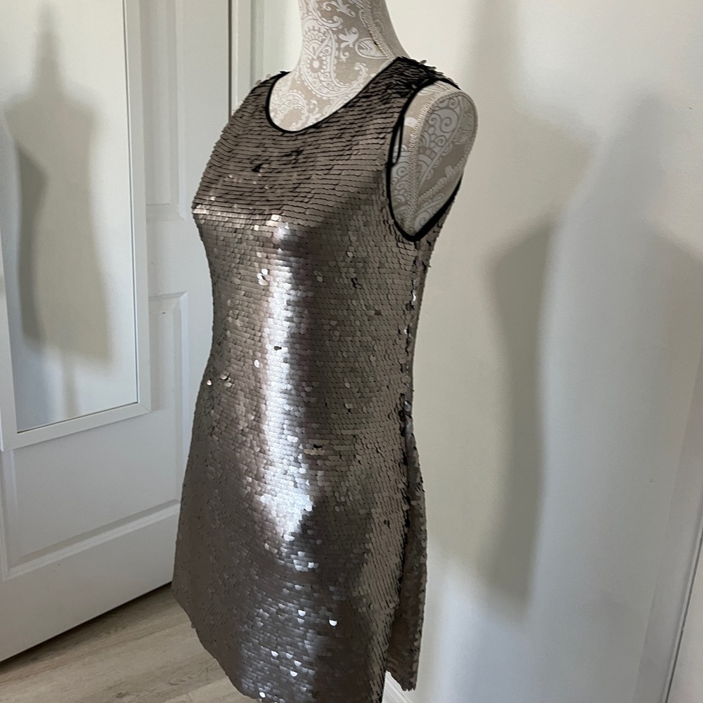 Woman’s gray dress